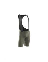 Spodenki rowerowe szosa gravel NORTHWAVE Fast Bib zielony. Zielone szorty męskie Northwave, z aplikacjami, z materiału. Za 479.99 zł.
