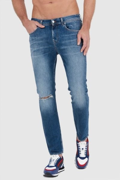 7 FOR ALL MANKIND Niebieskie męskie jeansy SLIMMY TAPERED, Rozmiar 33. Niebieskie jeansy męskie 7 FOR ALL MANKIND. W wyprzedaży za 541.99 zł.