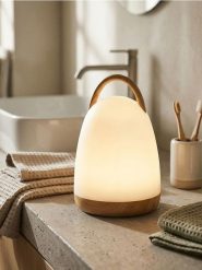 Bezprzewodowa lampka nocna LED z uchwytem - biały. Białe koszule nocne damskie Sinsay, bez wzorów. Za 25.99 zł.