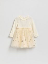 Bawełniana sukienka z tiulowym dołem - kremowy. Białe sukienki dziewczęce Reserved, bez wzorów, z bawełny, bez ramiączek. Za 79.99 zł.