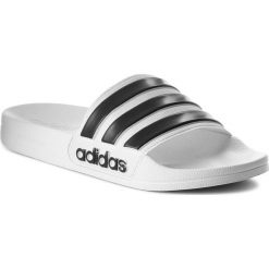 Klapki adidas - adilette Shower AQ1702 Ftwwht/Cblack/Ftwwht. Białe klapki damskie Adidas, bez wzorów, z tworzywa sztucznego, bez obcasa. Za 99.95 zł.