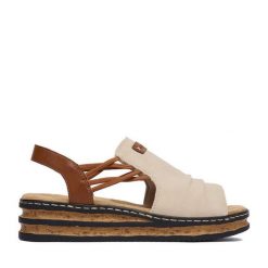 Sandały Rieker. Brązowe sandały damskie Rieker, bez wzorów, bez obcasa, na koturnie. Za 299.99 zł.