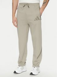 Adidas Spodnie dresowe Z.N.E. Open-Hem JC6716 Beżowy Loose Fit. Brązowe spodnie dresowe męskie Adidas, bez wzorów, z bawełny. Za 249.99 zł.