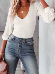 Milan Kiss Bluzka w kolorze białym rozmiar: S. Białe bluzki damskie Milan Kiss, s, bez wzorów, bez kołnierzyka, bez ramiączek. Za 126.99 zł.