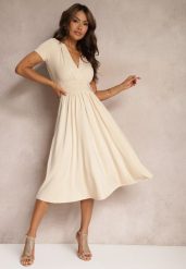 Beżowa Sukienka Taliowana z Kopertowym Dekoltem o Rozkloszowanym Kroju Rimadea. Brązowe sukienki damskie Renee, l, bez wzorów, eleganckie, bez kołnierzyka, bez ramiączek, midi, kopertowe. W wyprzedaży za 125.99 zł.