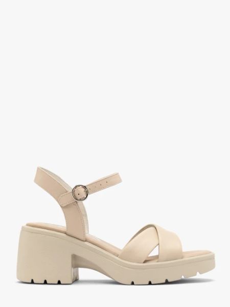 Kremowe sandały na masywnym spodzie. Brązowe sandały damskie Ryłko, bez wzorów, z gumy, bez obcasa. Za 349.99 zł.