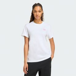 Koszulka Travel Loose Graphic. Białe t-shirty damskie Adidas, l, bez wzorów, z bawełny, bez kołnierzyka. Za 129.00 zł.