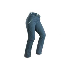 Spodnie turystyczne SH520 x-warm damskie. Szare spodnie materiałowe damskie QUECHUA, bez wzorów, z elastanu. Za 229.99 zł.