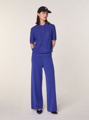 Rodier Wełniana koszulka w kolorze niebieskim rozmiar: M. Niebieskie bluzki damskie Rodier, m, bez wzorów, z wełny, bez kołnierzyka, bez ramiączek. Za 260.99 zł.