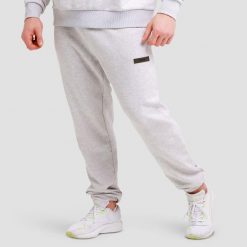 Spodnie męskie fitness regular szare Unity. Szare spodnie sportowe męskie GYMBEAM, z bawełny. Za 118.90 zł.