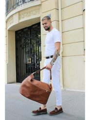 Maison héritage PARIS Skórzana torba podróżna "Jax" w kolorze karmelowym - 60 x 34 x 14 cm rozmiar: onesize. Brązowe torebki klasyczne damskie maison héritage PARIS, bez wzorów, z materiału, bez dodatków. Za 434.99 zł.