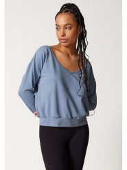 Skiny Koszulka w kolorze błękitnym rozmiar: 42. Niebieskie bluzki damskie Skiny, bez wzorów, z bawełny, bez kołnierzyka, bez ramiączek. Za 156.61 zł.