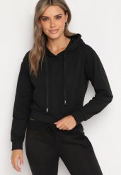 Czarna Bluza z Dodatkiem Bawełny z Kapturem Wykończona Ściągaczami Evista. Czarne bluzy z kapturem damskie Born2be, l, z bawełny. Za 39.99 zł.