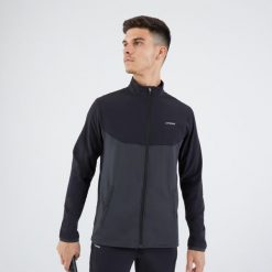 Kurtka do tenisa męska Artengo Essential. Czarne kurtki męskie ARTENGO, m, bez wzorów, z meshu, eleganckie, bez kaptura. Za 119.99 zł.