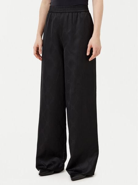 HUGO Spodnie materiałowe Harida-1 50538802 Czarny Relaxed Fit. Czarne spodnie materiałowe damskie Hugo, bez wzorów, z materiału. Za 389.99 zł.