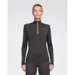 Damski półzapinany sweter treningowy z wełny Daehlie Sportswear Performance. Niebieskie swetry klasyczne damskie DAEHLIE, l, z lyocellu, bez kołnierzyka. Za 435.50 zł.