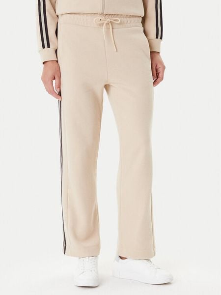 EA7 Emporio Armani Spodnie dresowe 7W000568 AF15528 U1046 Beżowy Relaxed Fit. Brązowe spodnie dresowe damskie EA7 Emporio Armani, xl, bez wzorów, z dresówki. Za 369.99 zł.