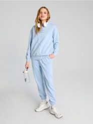 Bluza hoodie - błękitny. Niebieskie bluzy bez kaptura damskie Sinsay, l. W wyprzedaży za 19.99 zł.