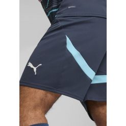 Męskie szorty RB Leipzig PUMA Dark Night Hero Blue. Niebieskie szorty męskie Puma, bez kołnierzyka. W wyprzedaży za 177.30 zł.