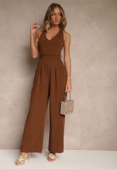 Brązowy Kombinezon o Taliowanym Kroju z Dekoltem Halter i Wiązanym Paskiem Malisena. Brązowe kombinezony damskie Renee, l, bez wzorów, eleganckie, bez kołnierzyka, bez ramiączek. Za 99.99 zł.