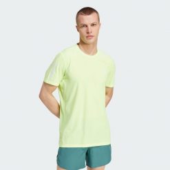 Koszulka Own The Run. Zielone t-shirty sportowe męskie Adidas, m, bez ramiączek, do biegania. Za 149.00 zł.