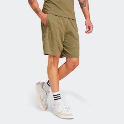 Spodenki fitness męskie ADIDAS. Zielone szorty męskie Adidas, m, z bawełny, na fitness i siłownię. Za 79.99 zł.