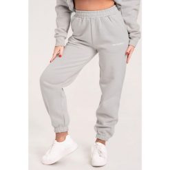 Spodnie fitness damskie Gym Glamour dresowe. Szare spodnie dresowe damskie GYM GLAMOUR, m, z dresówki, na fitness i siłownię. Za 189.99 zł.