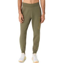 Spodnie do biegania Asics Logo. Zielone spodnie materiałowe męskie Asics, bez wzorów, z dresówki. Za 276.50 zł.