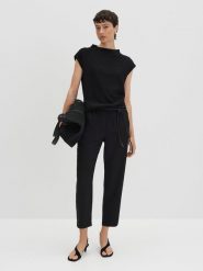 Someday Koszulka "Keala" w kolorze czarnym rozmiar: 36. Czarne bluzki damskie Someday, bez wzorów, bez kołnierzyka. Za 95.99 zł.