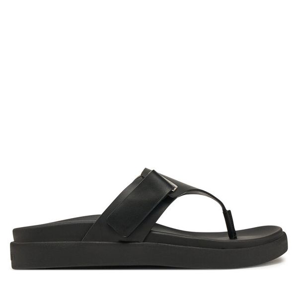 Sandały Calvin Klein. Czarne sandały damskie CALVIN KLEIN, bez wzorów, bez obcasa, na płaskiej podeszwie. Za 379.99 zł.