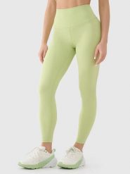 4F Legginsy funkcyjne w kolorze żółtym rozmiar: L. Żółte legginsy sportowe damskie 4f, l, bez wzorów, z materiału, na fitness i siłownię. Za 92.42 zł.