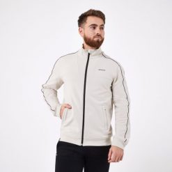 Bluza do tenisa męska Artengo Soft. Brązowe bluzy bez kaptura męskie ARTENGO, m, z bawełny. Za 129.99 zł.