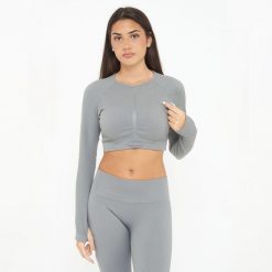 Koszulka Crop Top treningowa IMALA długie rękawy. Szare bluzki sportowe damskie Legea, z elastanu, bez kołnierzyka, bez ramiączek. W wyprzedaży za 95.50 zł.
