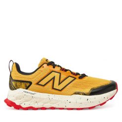 Buty do biegania New Balance. Żółte obuwie do biegania damskie New Balance. Za 449.99 zł.