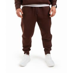 Spodnie INTERLOCK OVERSIZE DZIK® brązowe. Brązowe spodnie materiałowe męskie DZIK, bez wzorów, sportowe. Za 289.99 zł.