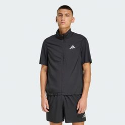 Kurtka bez rękawów adidas Essentials. Czarne kurtki treningowe męskie Adidas, bez wzorów, do biegania. Za 219.00 zł.