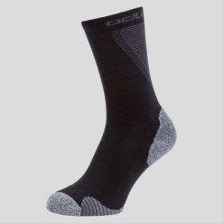 Skarpety Active Warm ODLO. Czarne skarpetki damskie Odlo, bez wzorów, z materiału. Za 96.85 zł.