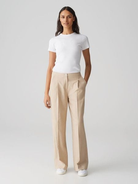 OPUS Spodnie "Maiga" w kolorze beżowym rozmiar: 36. Brązowe spodnie materiałowe damskie Opus, bez wzorów, z materiału, z podwyższonym stanem. Za 199.49 zł.