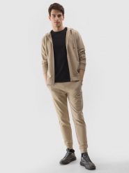 4F Spodnie dresowe joggery męskie - beżowe L. Brązowe spodnie dresowe męskie 4f, bez wzorów, z bawełny. W wyprzedaży za 79.99 zł.