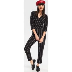 Elegancki kombinezon - Czarny. Czarne kombinezony damskie Reserved, bez wzorów, eleganckie, bez kołnierzyka, bez ramiączek. Za 349.99 zł.