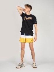 Champion T-Shirt "Giants" | 213338 | Mężczyzna | Czarny. Czarne t-shirty męskie CHAMPION, m, bez wzorów, z bawełny, bez kołnierzyka. W wyprzedaży za 79.00 zł.