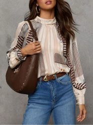 Milan Kiss Bluzka w kolorze kremowo-brązowym rozmiar: M. Brązowe bluzki damskie Milan Kiss, m, bez wzorów, bez kołnierzyka, bez ramiączek. Za 152.99 zł.