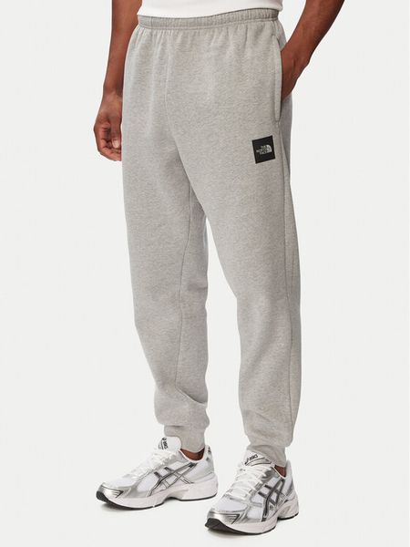 The North Face Spodnie dresowe Evo Box Hd NF0A8JB0 Szary Regular Fit. Szare spodnie dresowe męskie The North Face, bez wzorów, z bawełny. Za 279.99 zł.