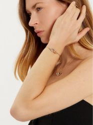 Tory Burch Naszyjnik Interlocking Wishbone Pendant 161070 Złoty. Żółte naszyjniki damskie Tory Burch, metalowe. Za 539.99 zł.