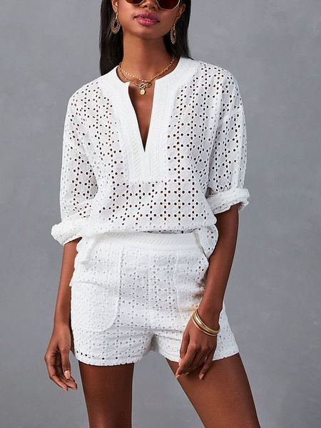 LA Angels Bluzka w kolorze białym rozmiar: XL. Białe bluzki damskie LA Angels, xl, bez wzorów, z bawełny, bez kołnierzyka, bez ramiączek. Za 165.31 zł.