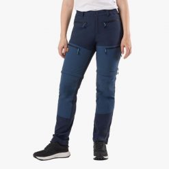 Spodnie Wędrówki damska Swedemount Lofoten Stretch Zip-Off Pants wodoodporna. Niebieskie spodnie dresowe damskie SWEDEMOUNT, bez wzorów, z tkaniny. Za 449.99 zł.