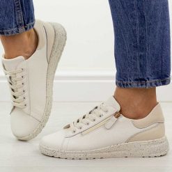 Beżowe skórzane półbuty damskie Jezzi 138. Brązowe półbuty damskie Jezzi, bez wzorów, z jeansu, casualowe, bez obcasa, na płaskiej podeszwie. Za 239.00 zł.