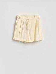 Szorty z wiskozą - żółty. Żółte szorty damskie Reserved, bez wzorów, z tkaniny. Za 119.99 zł.