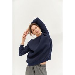 Bluza do jogi Moonholi Cozy AF Oversize Sweatshirt z bawełnianej dzianiny. Czerwone bluzy bez kaptura damskie MOONHOLI, s, z bawełny. Za 429.00 zł.