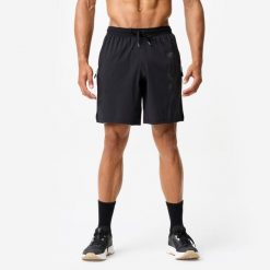 Spodenki fitness Domyos. Czarne szorty męskie DOMYOS, bez wzorów, z elastanu, sportowe. Za 89.99 zł.